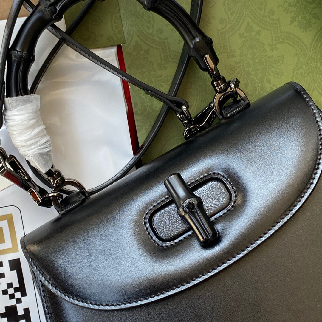 G*u*i bamboo handle bag