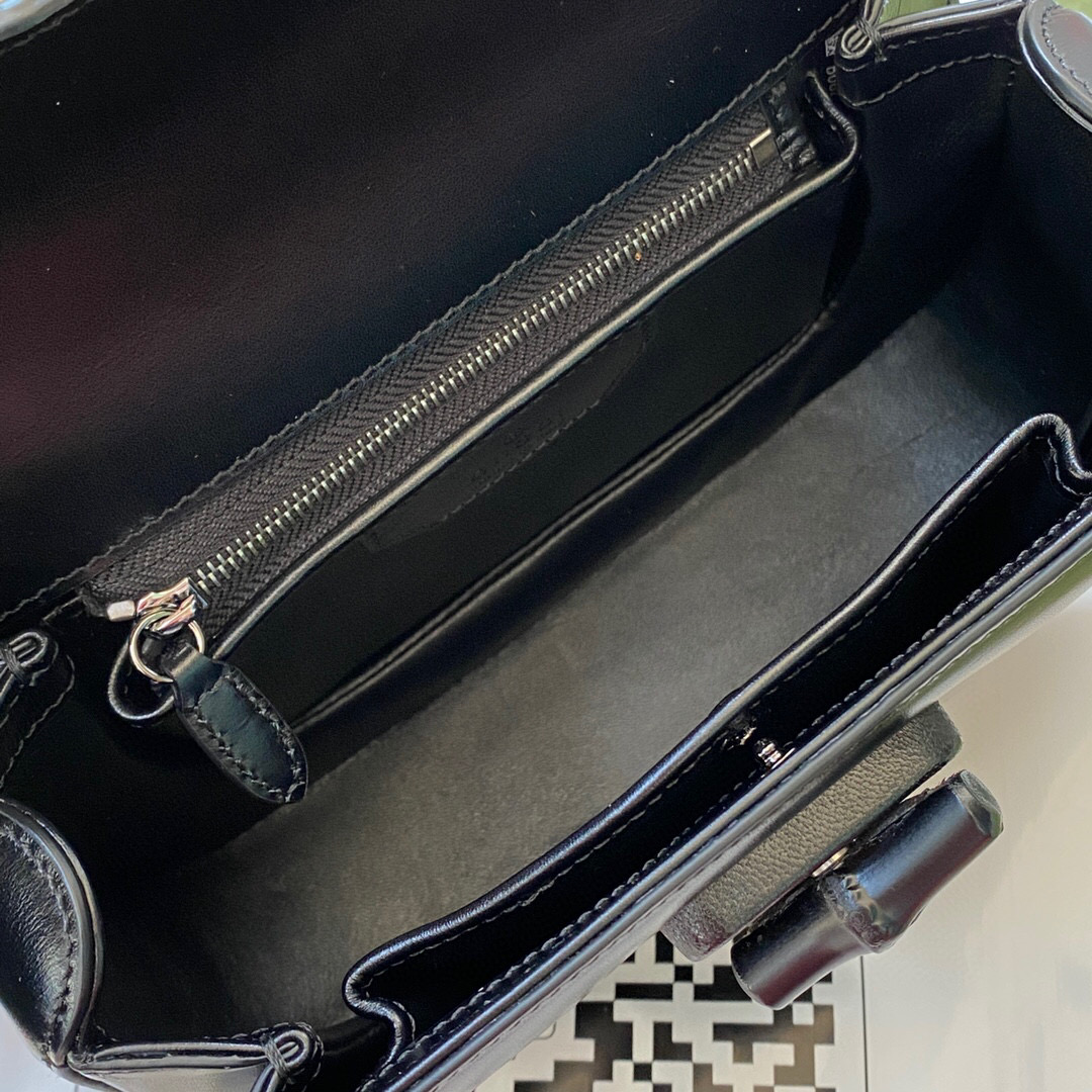 G*u*i bamboo handle bag