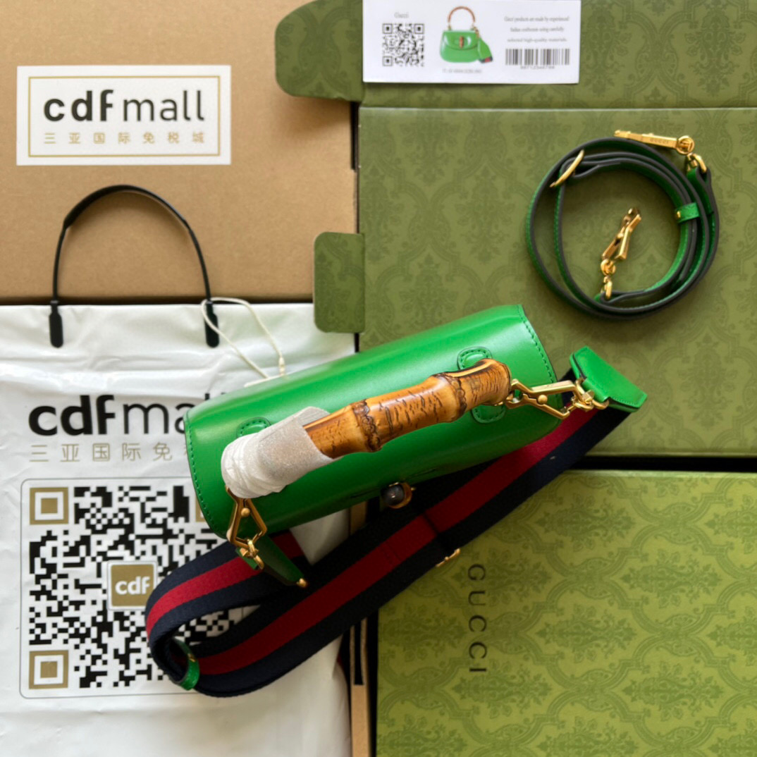 G*u*i bamboo handle bag