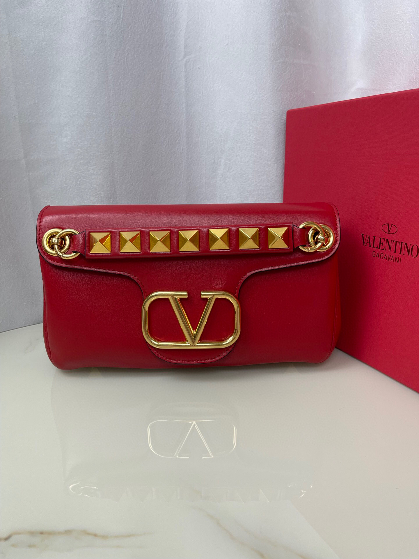 Valentino Stud Sign