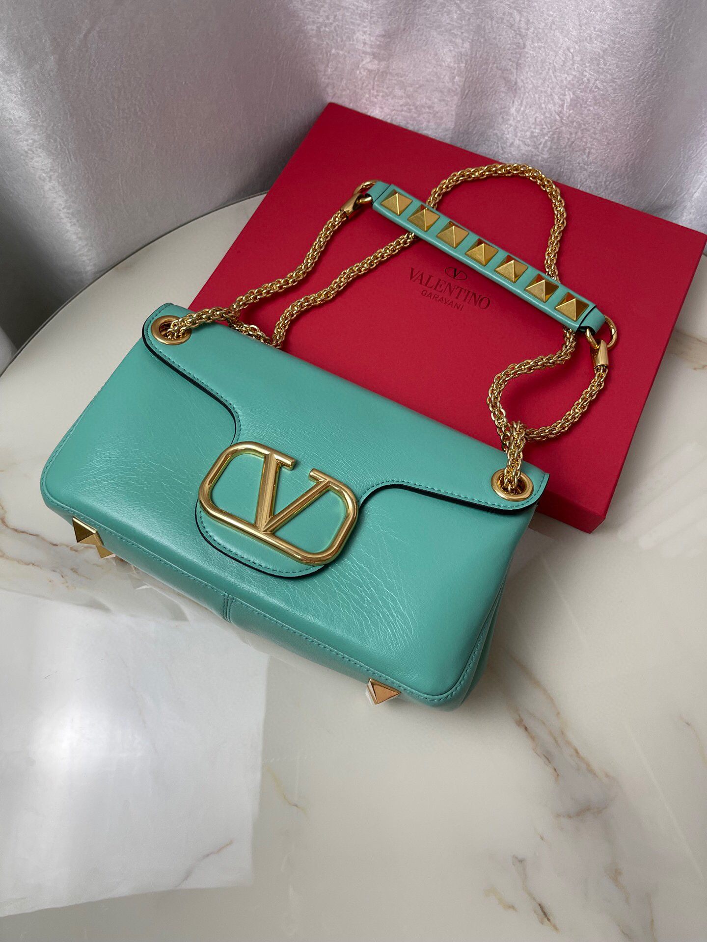 Valentino Stud Sign