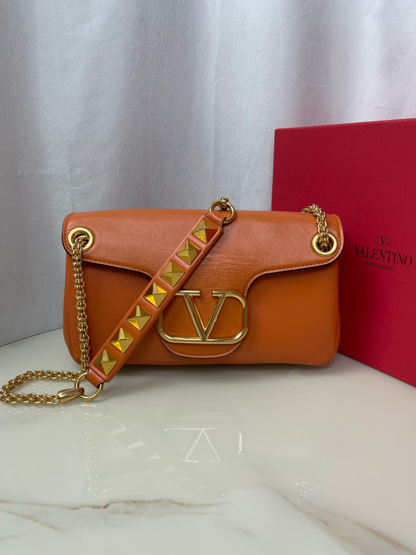 Valentino Stud Sign