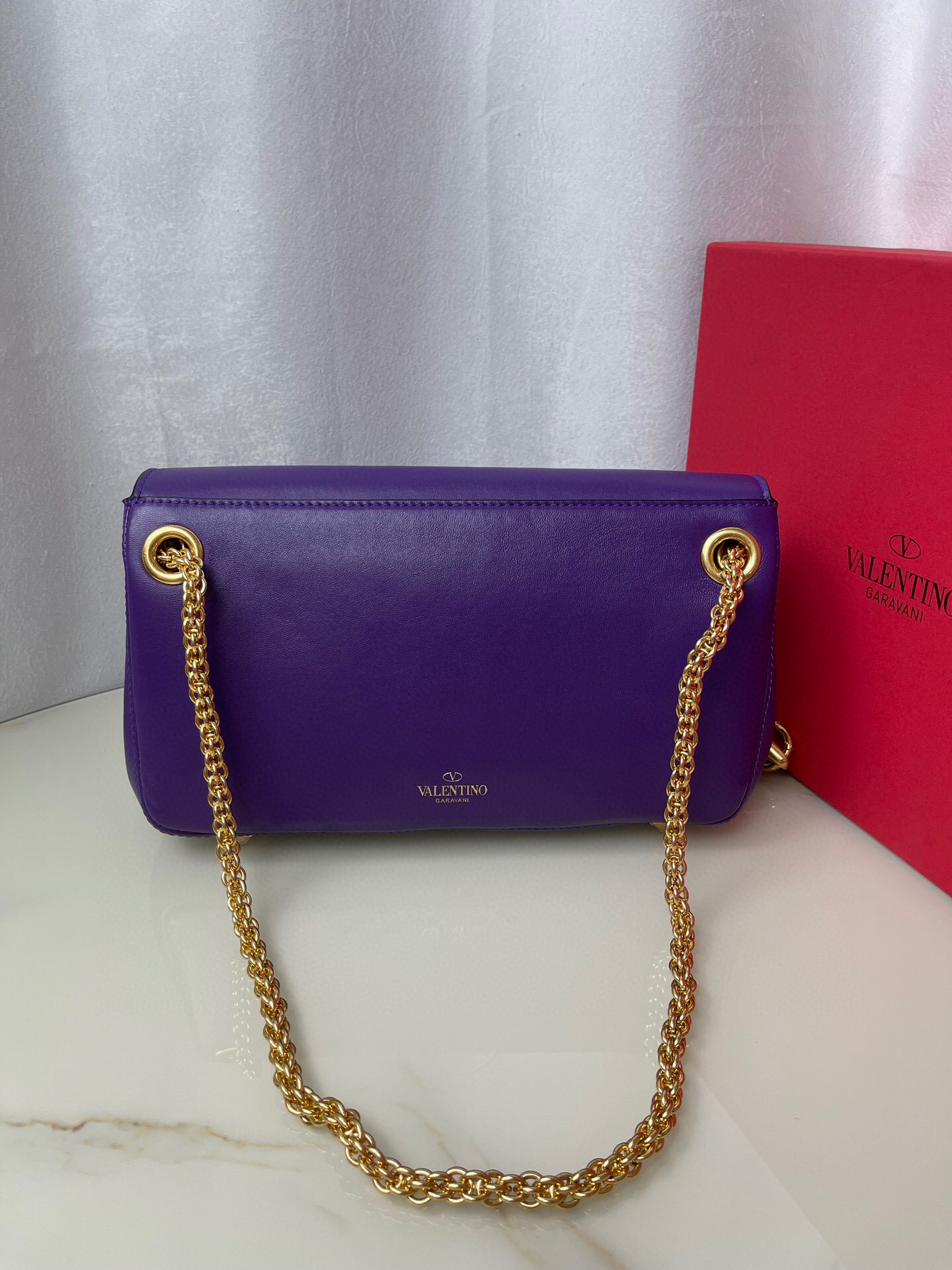 Valentino Stud Sign