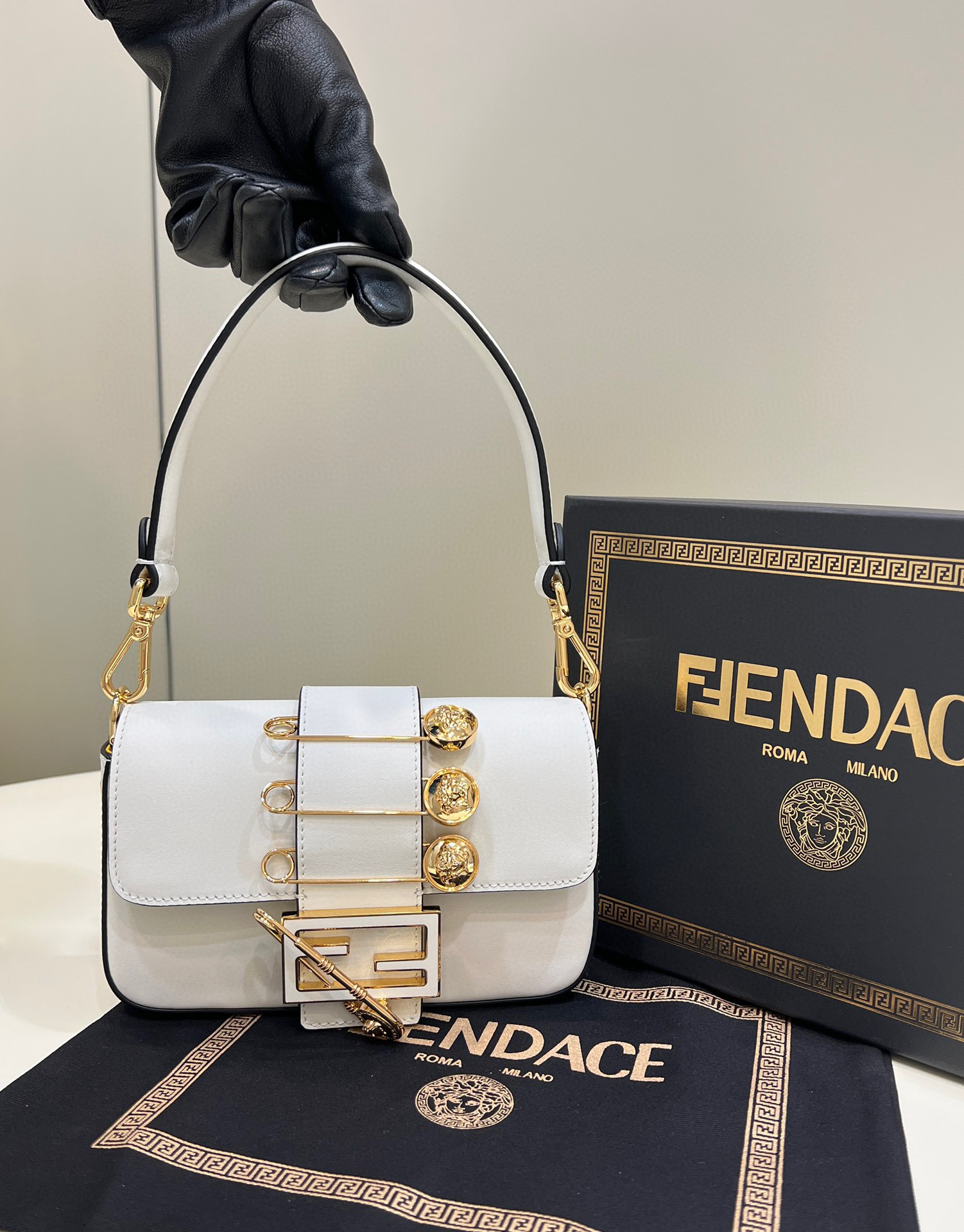 F**di & versace bagutte