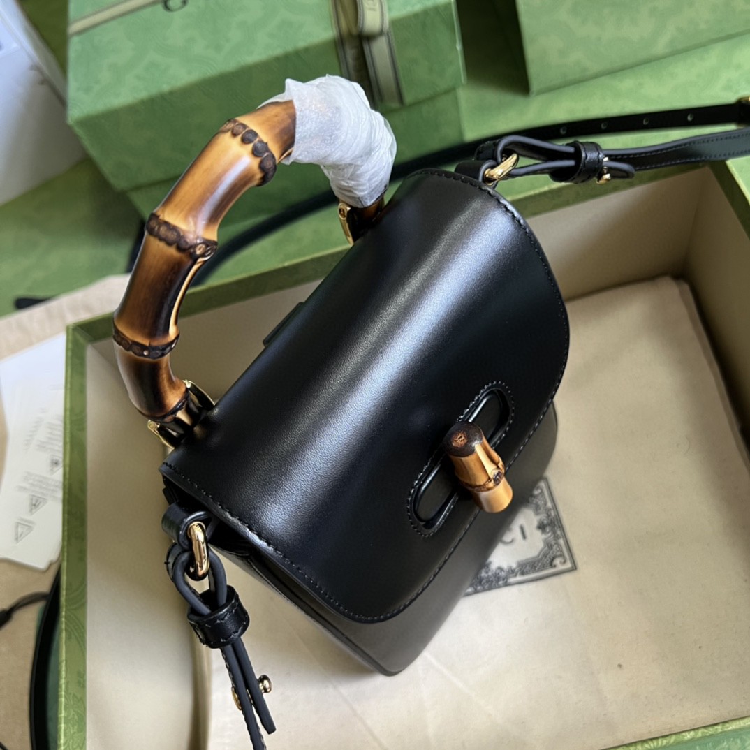 G*u*i bamboo mini handbag