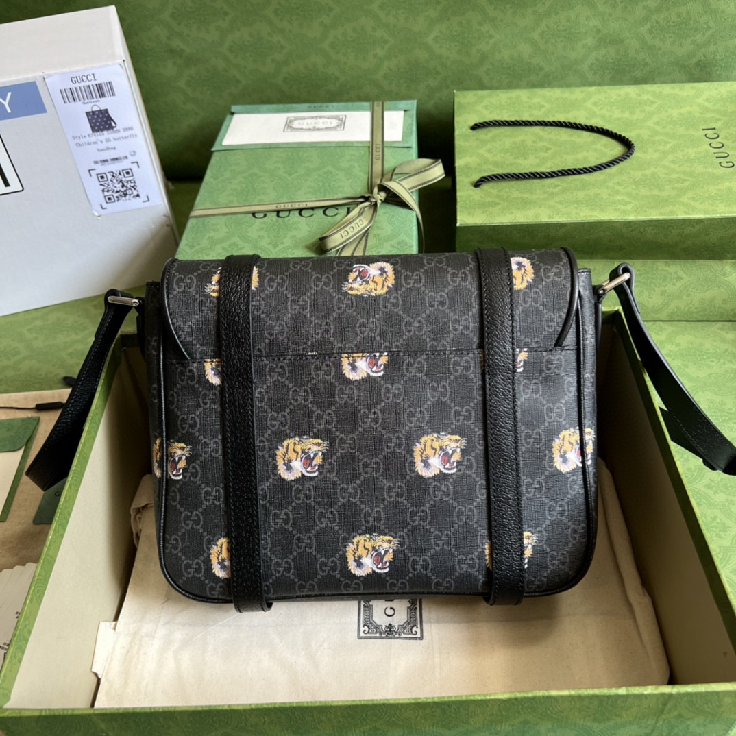 G*u*i gg messenger bag