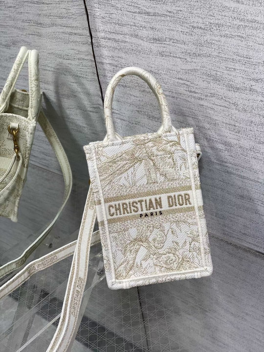 mini D*or book tote phone bag