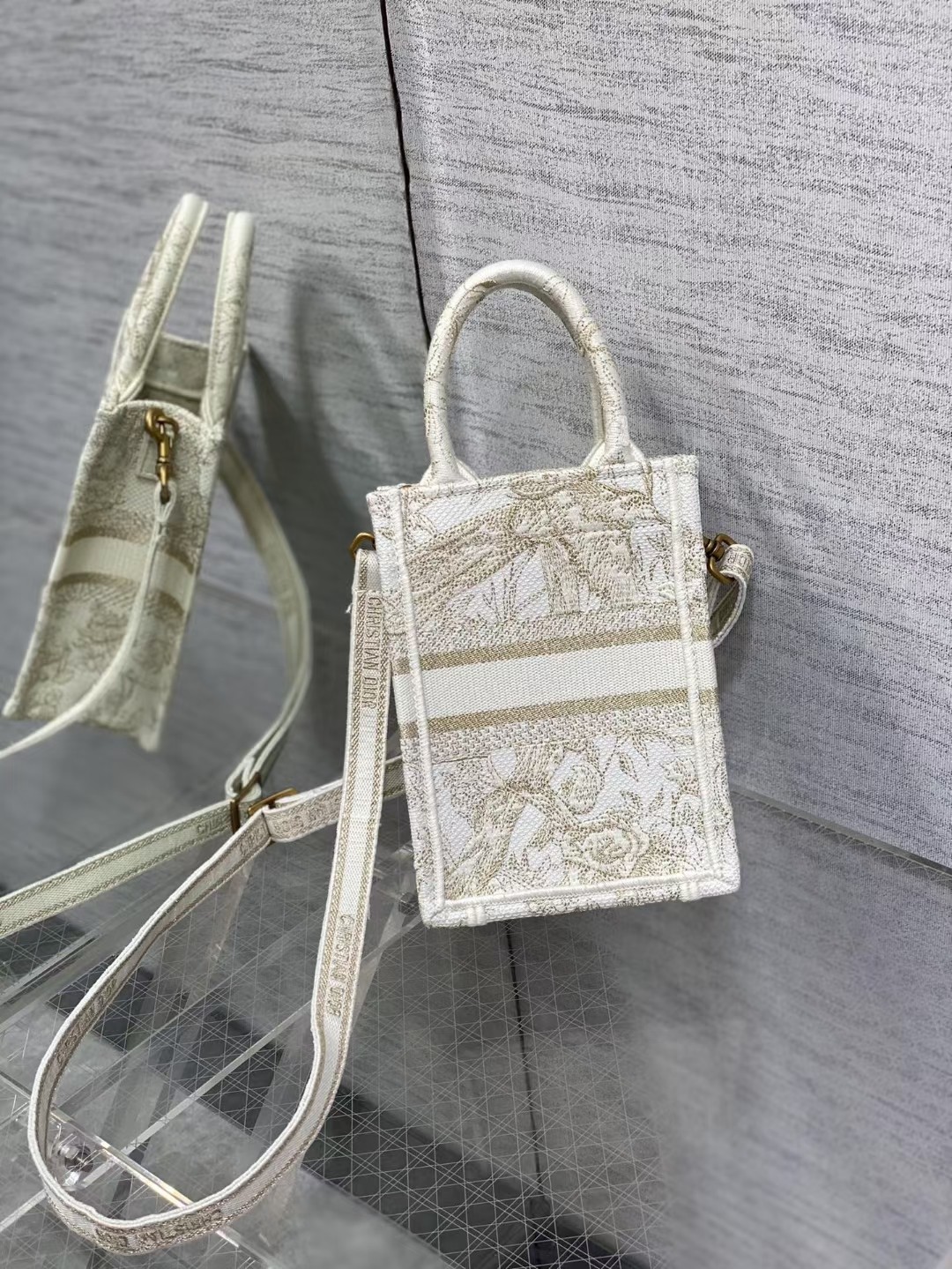 mini D*or book tote phone bag
