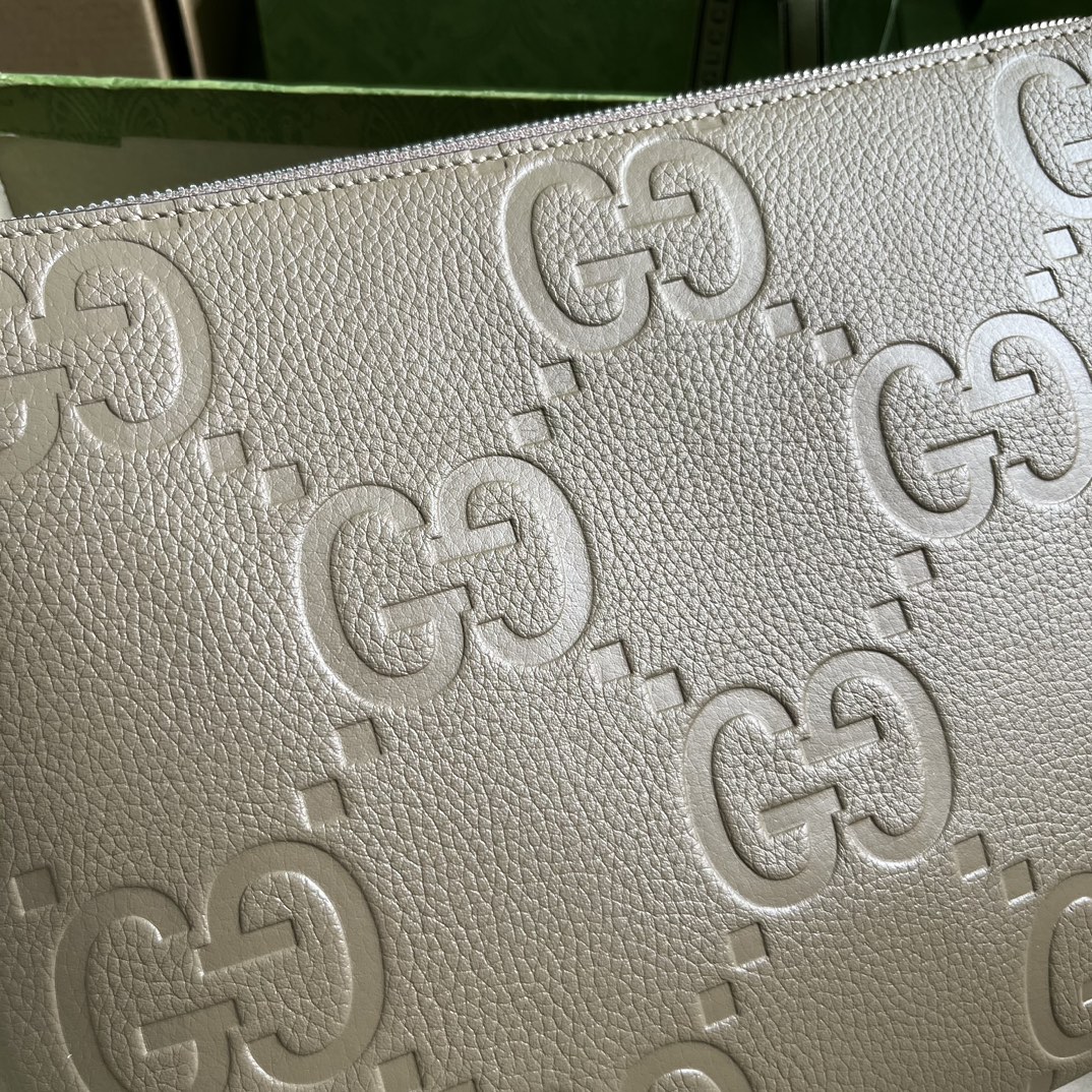 G*u*i gg embossed medium messenger bag