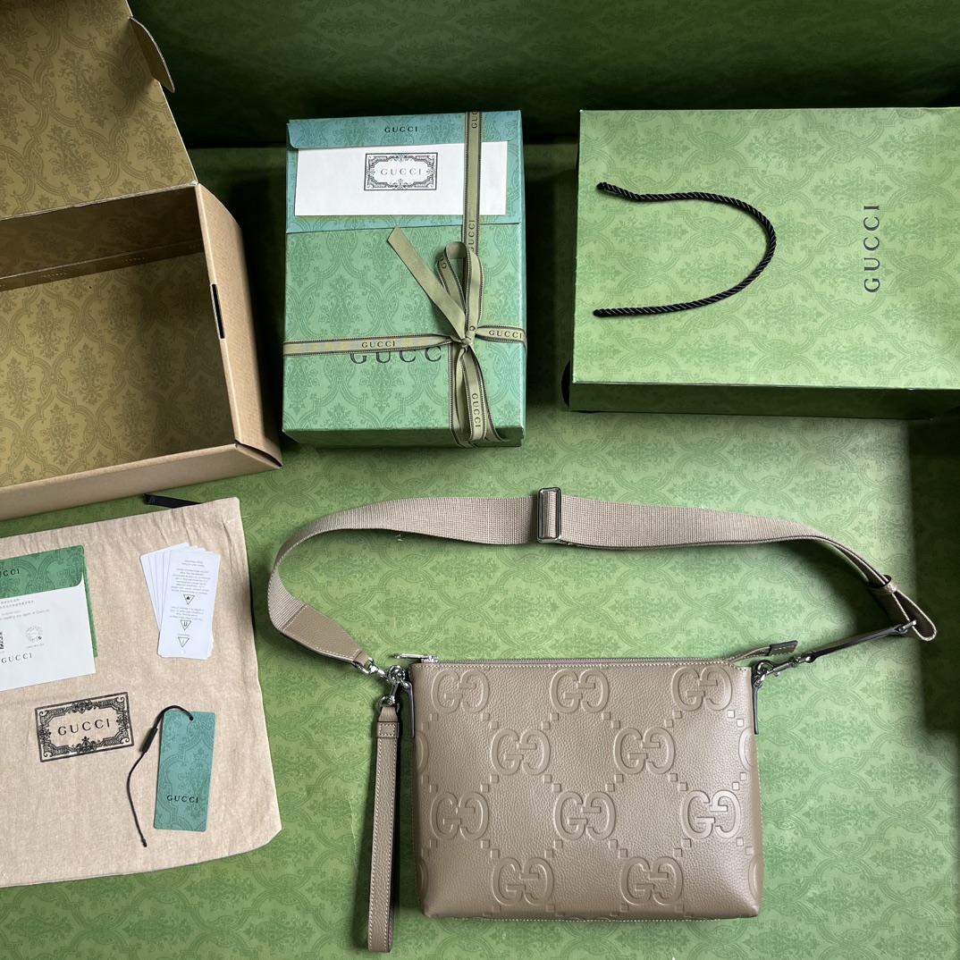 G*u*i gg embossed medium messenger bag