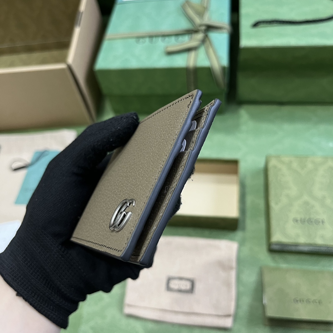 G*u*i gg marmont leather bi-fold wallet