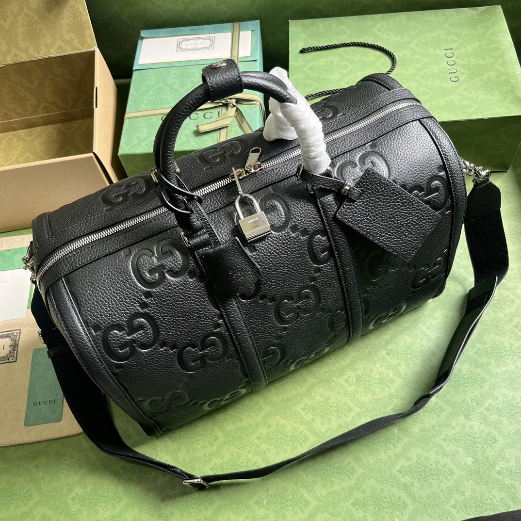 G*u*i gg duffle bag