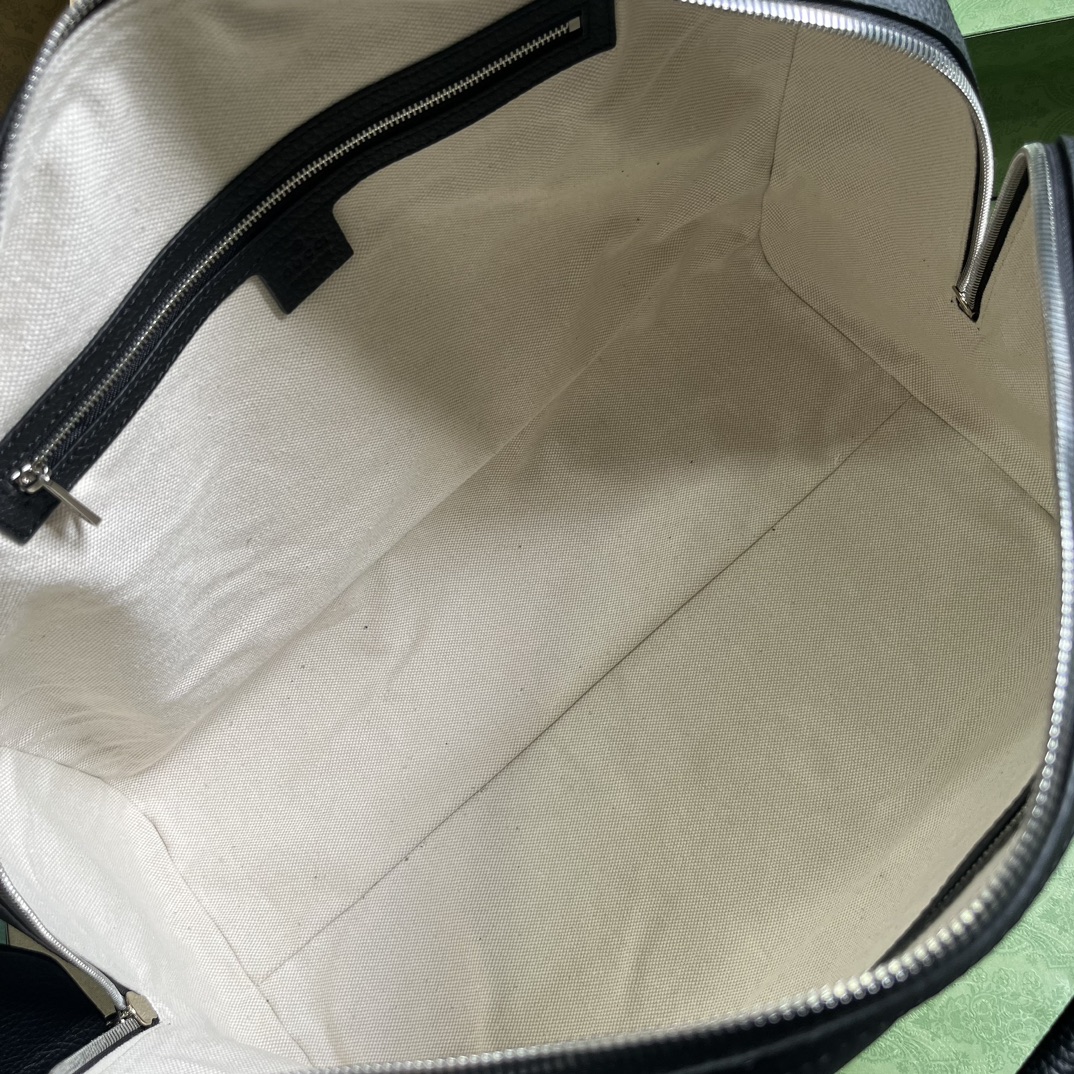 G*u*i gg duffle bag