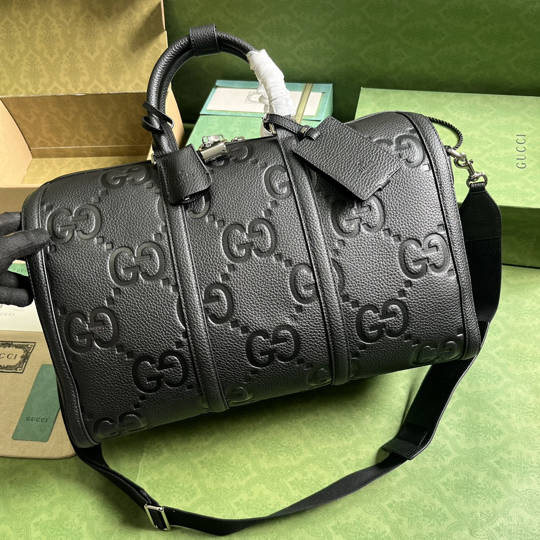 G*u*i gg duffle bag