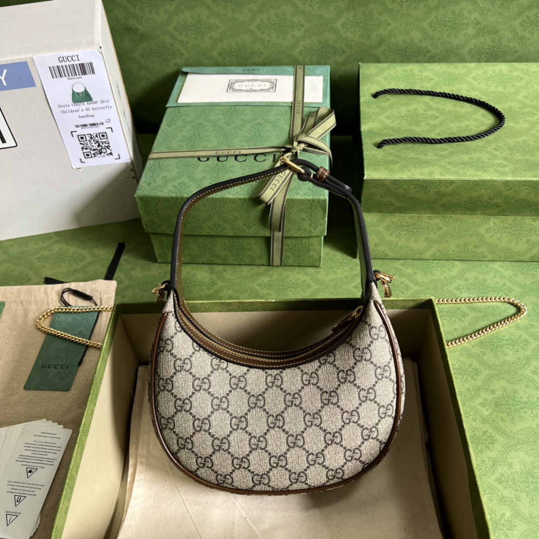 G*u*i half-moon-shaped mini bag with interlocking g