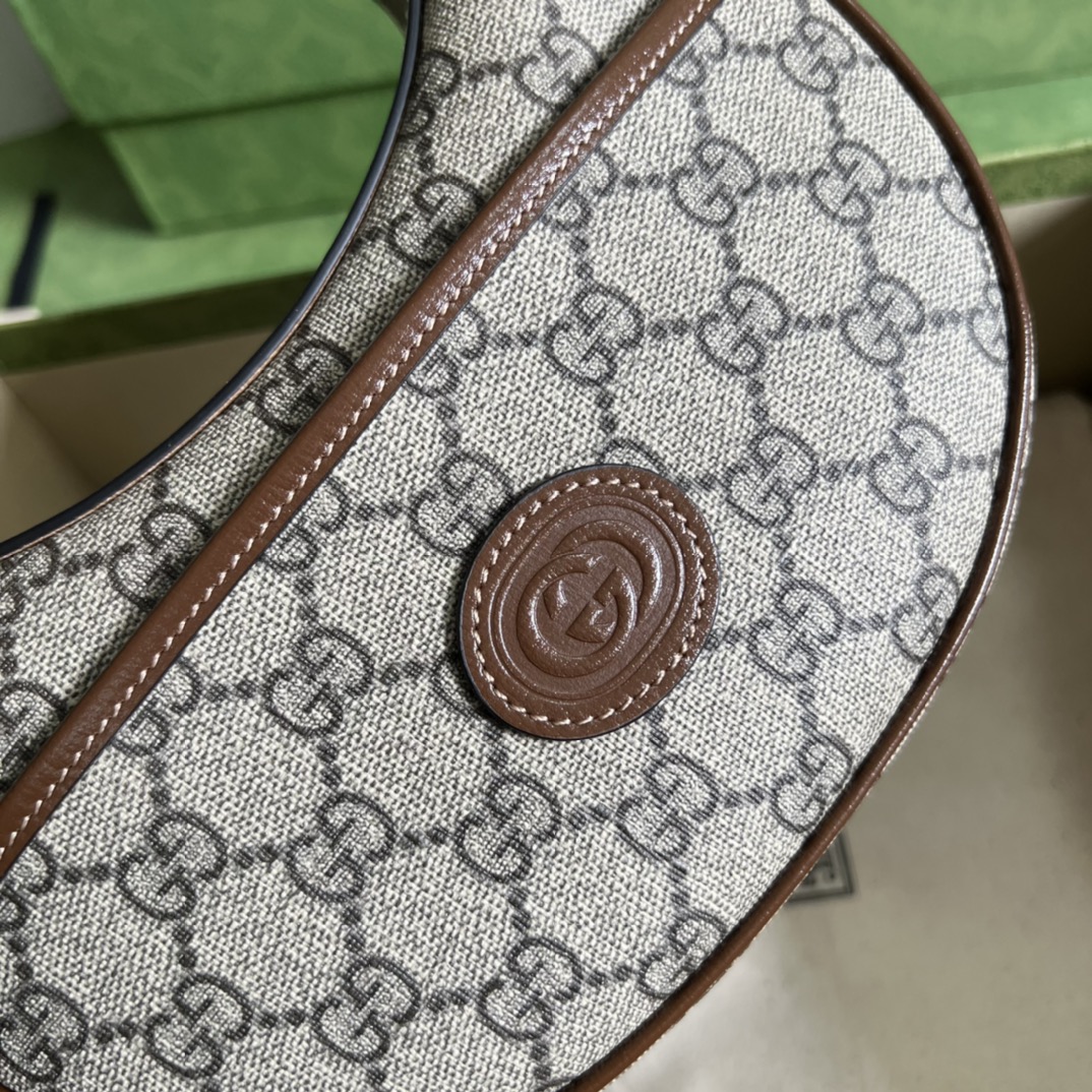 G*u*i half-moon-shaped mini bag with interlocking g