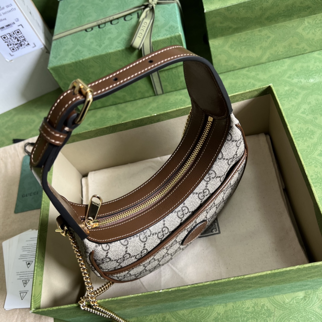 G*u*i half-moon-shaped mini bag with interlocking g