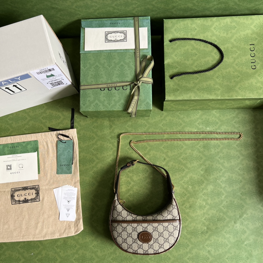 G*u*i half-moon-shaped mini bag with interlocking g