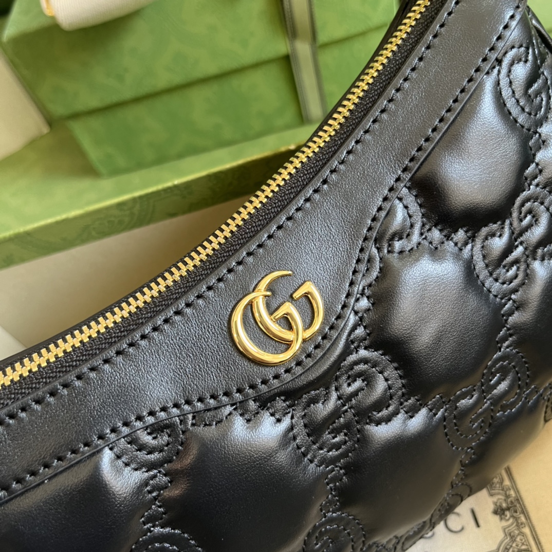 G*u*i matelassé handbag