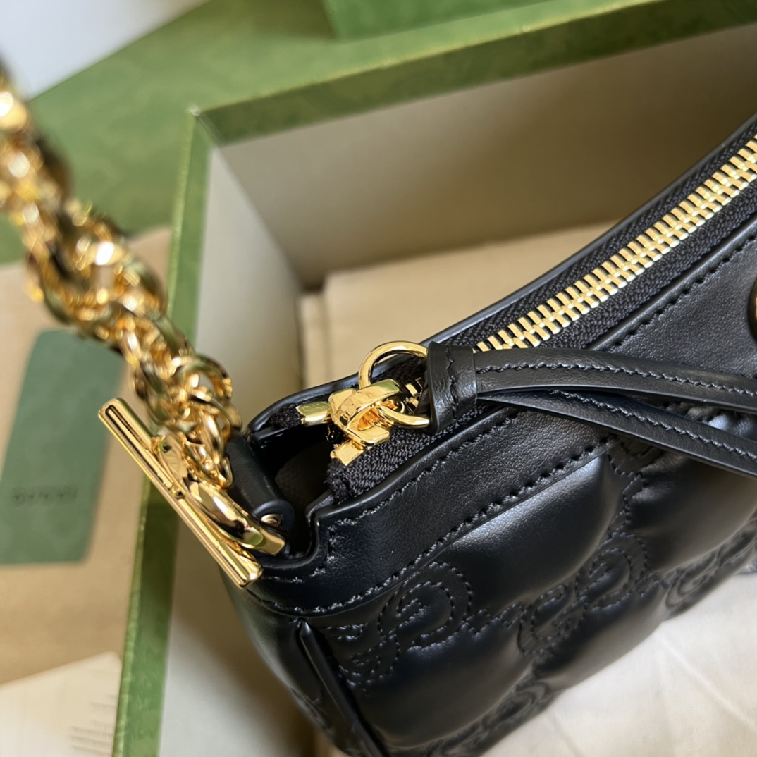 G*u*i matelassé handbag