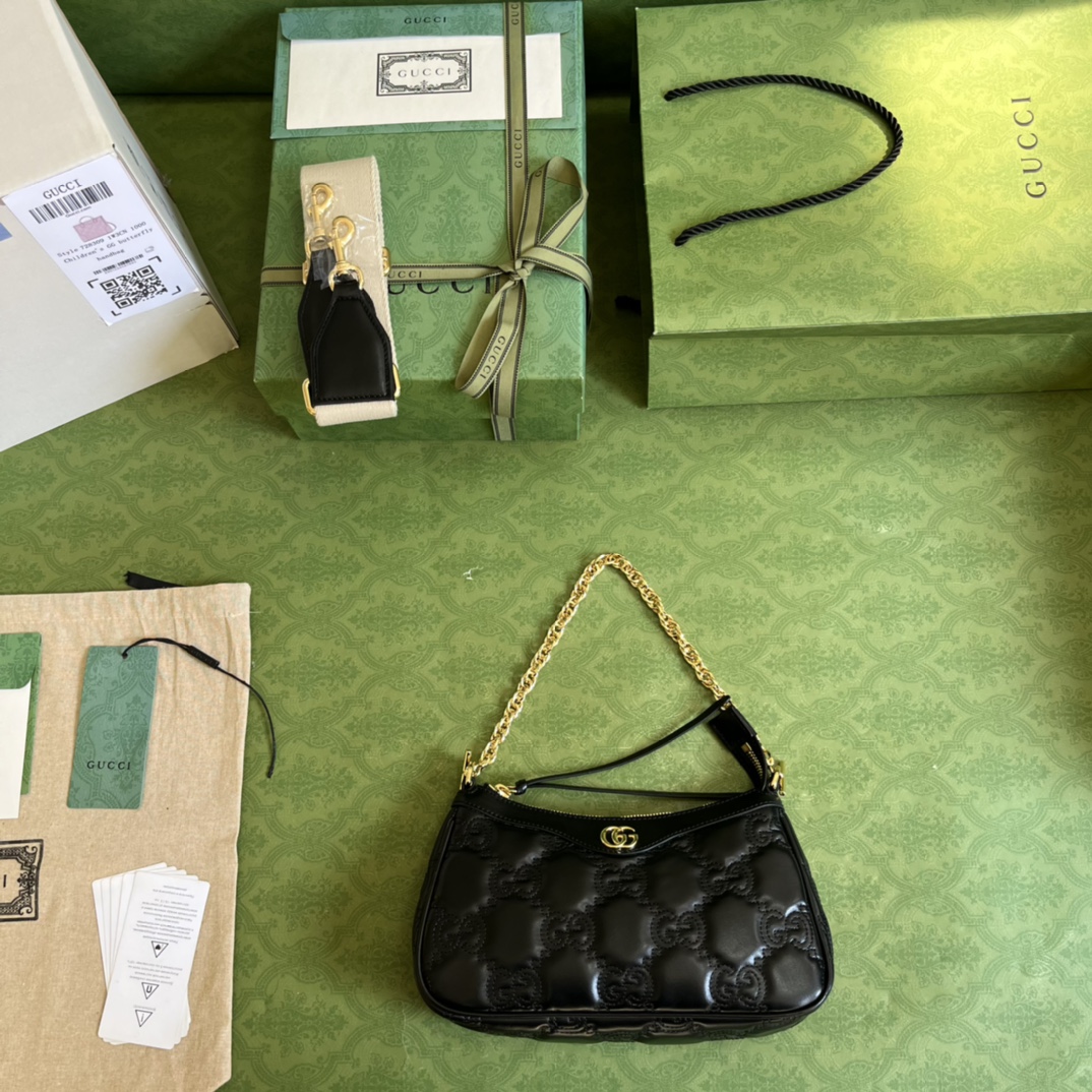 G*u*i matelassé handbag