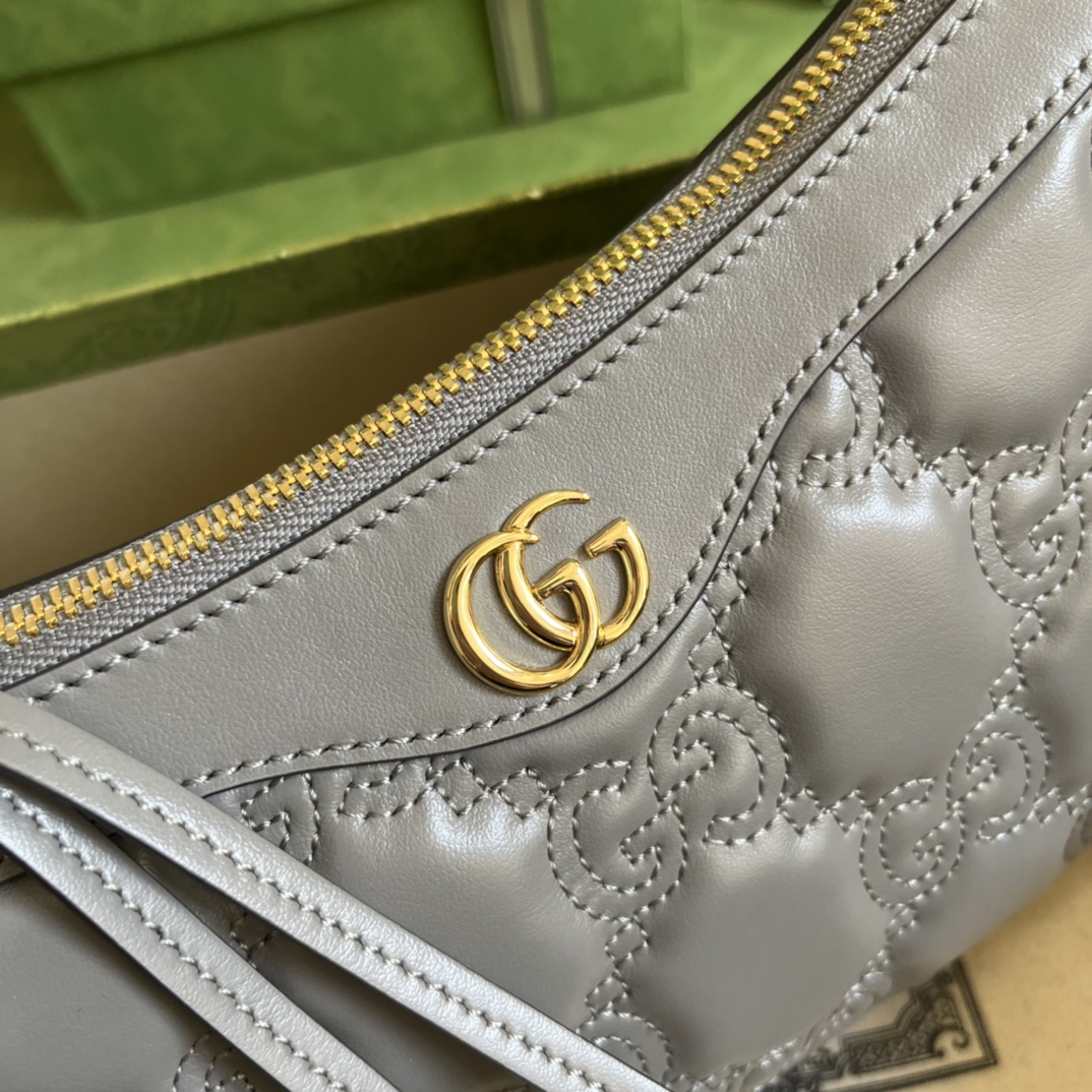 G*u*i matelassé handbag