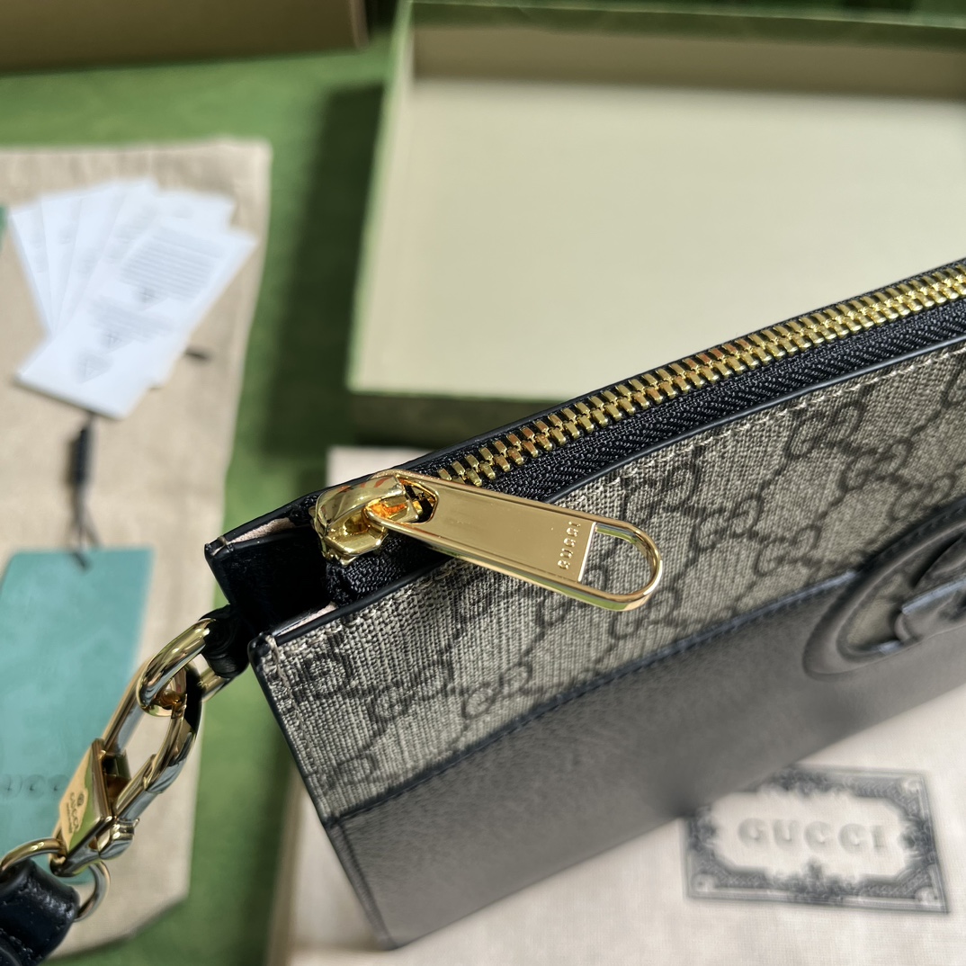 G*u*i pouch with cut-out interlocking g