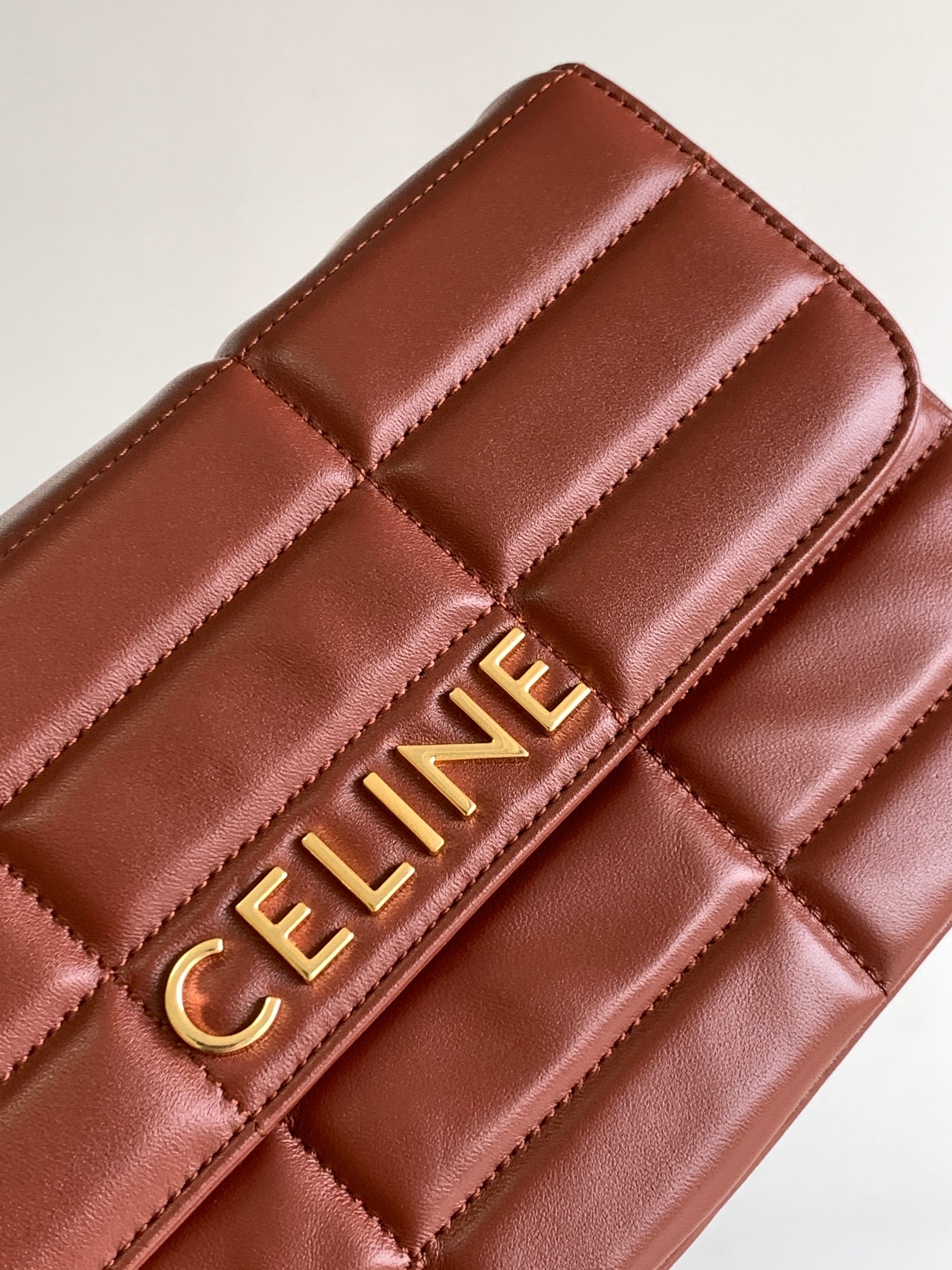 Ce**e chain shoulder bag matelasse monochrome