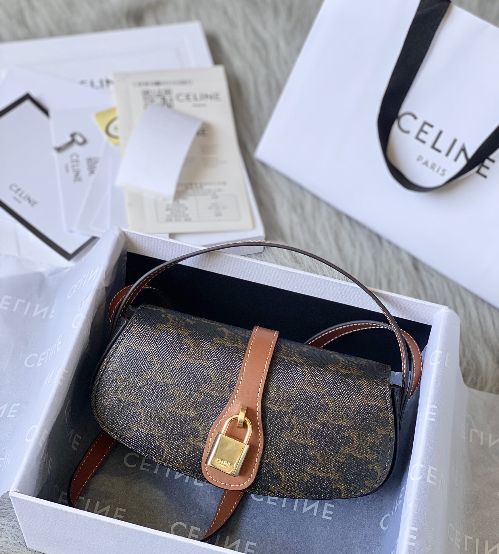 Ce**e mini tabou clutch on strap