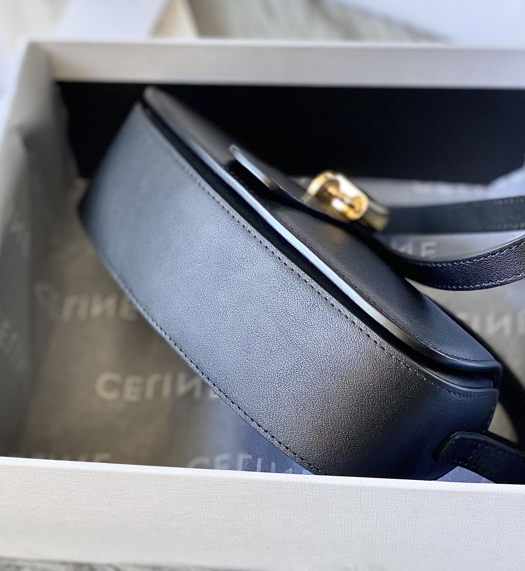 Ce**e mini tabou clutch on strap