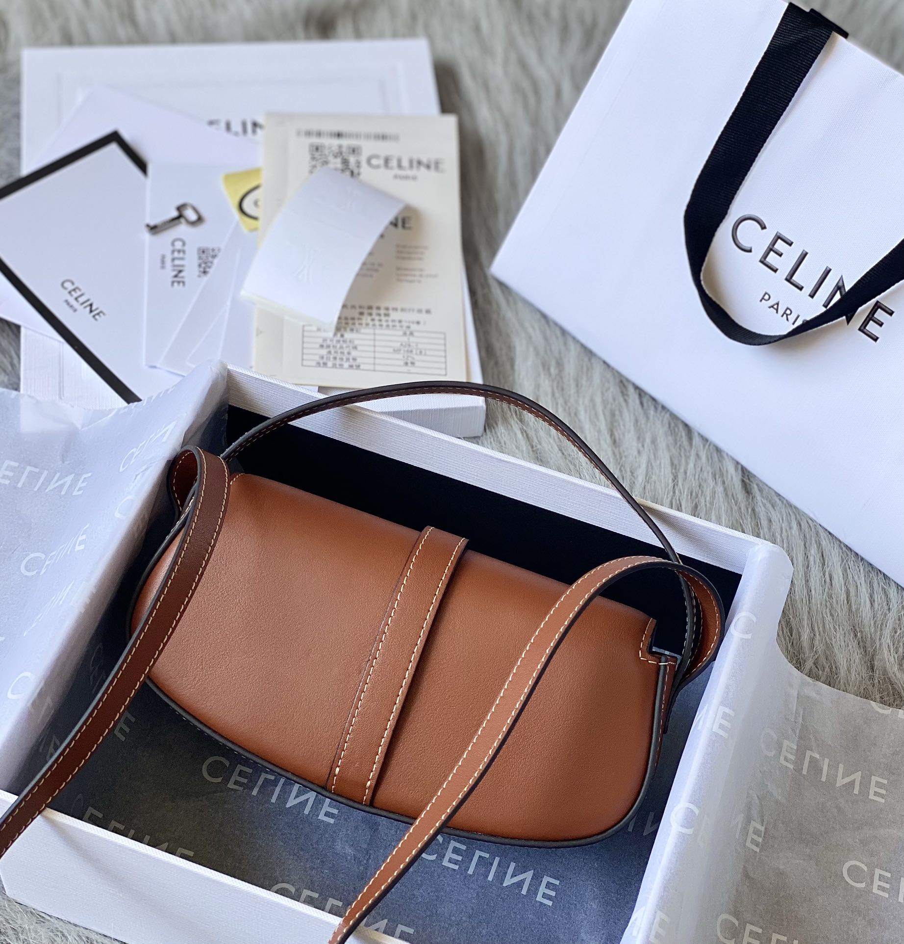 Ce**e mini tabou clutch on strap