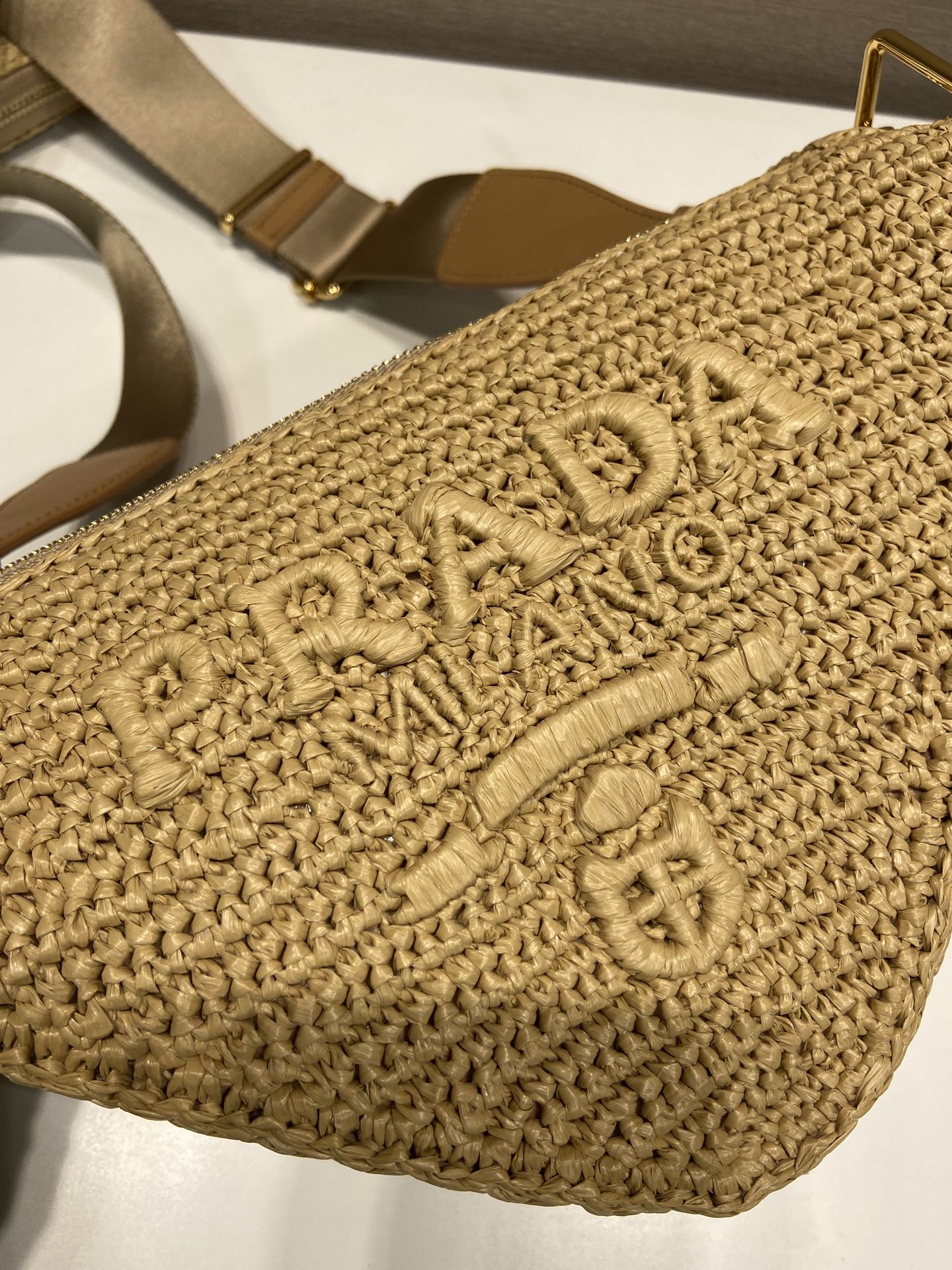 Pra*a triangle shoulder bag