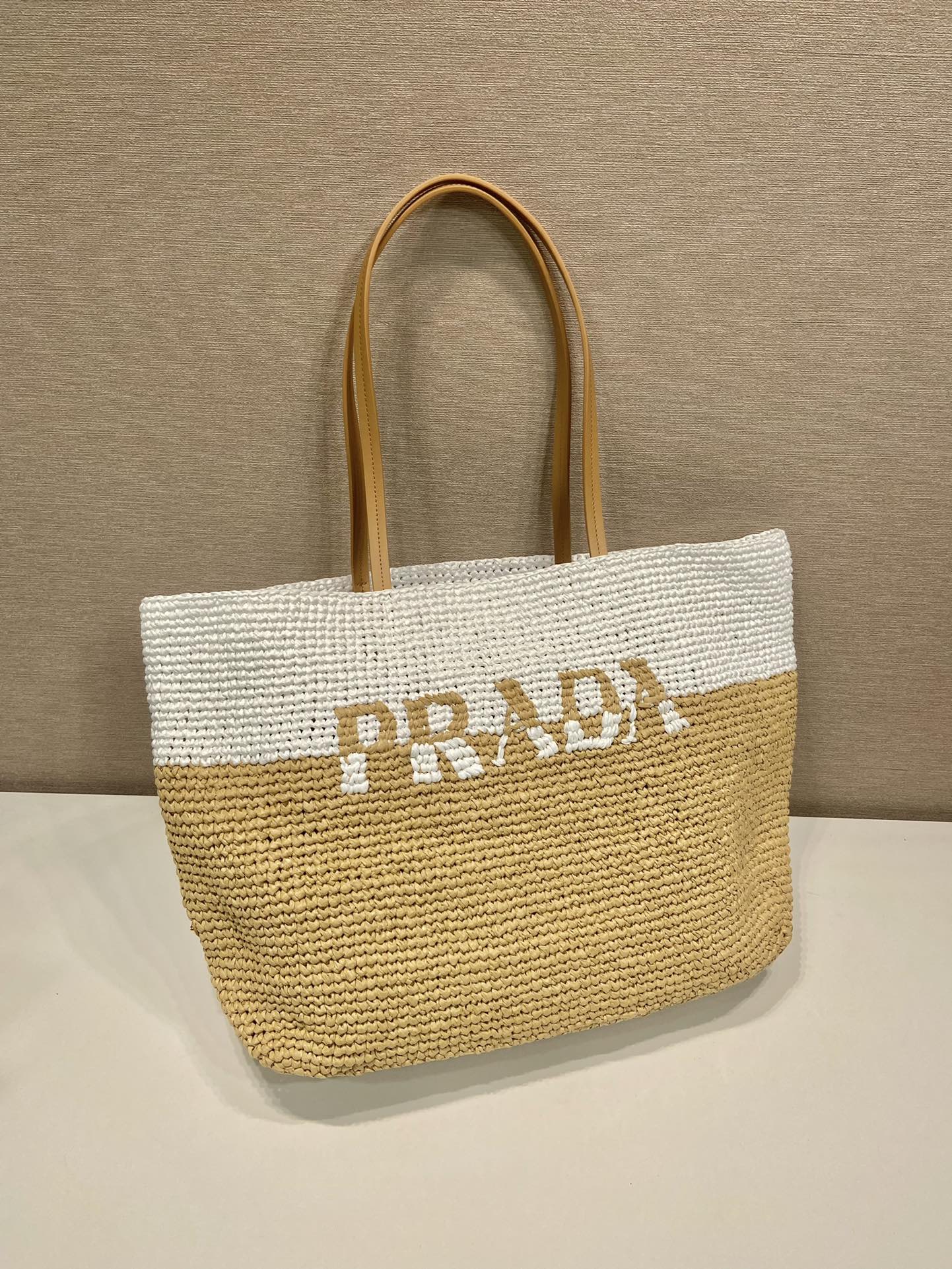 Pra*a crochet and leather tote bag