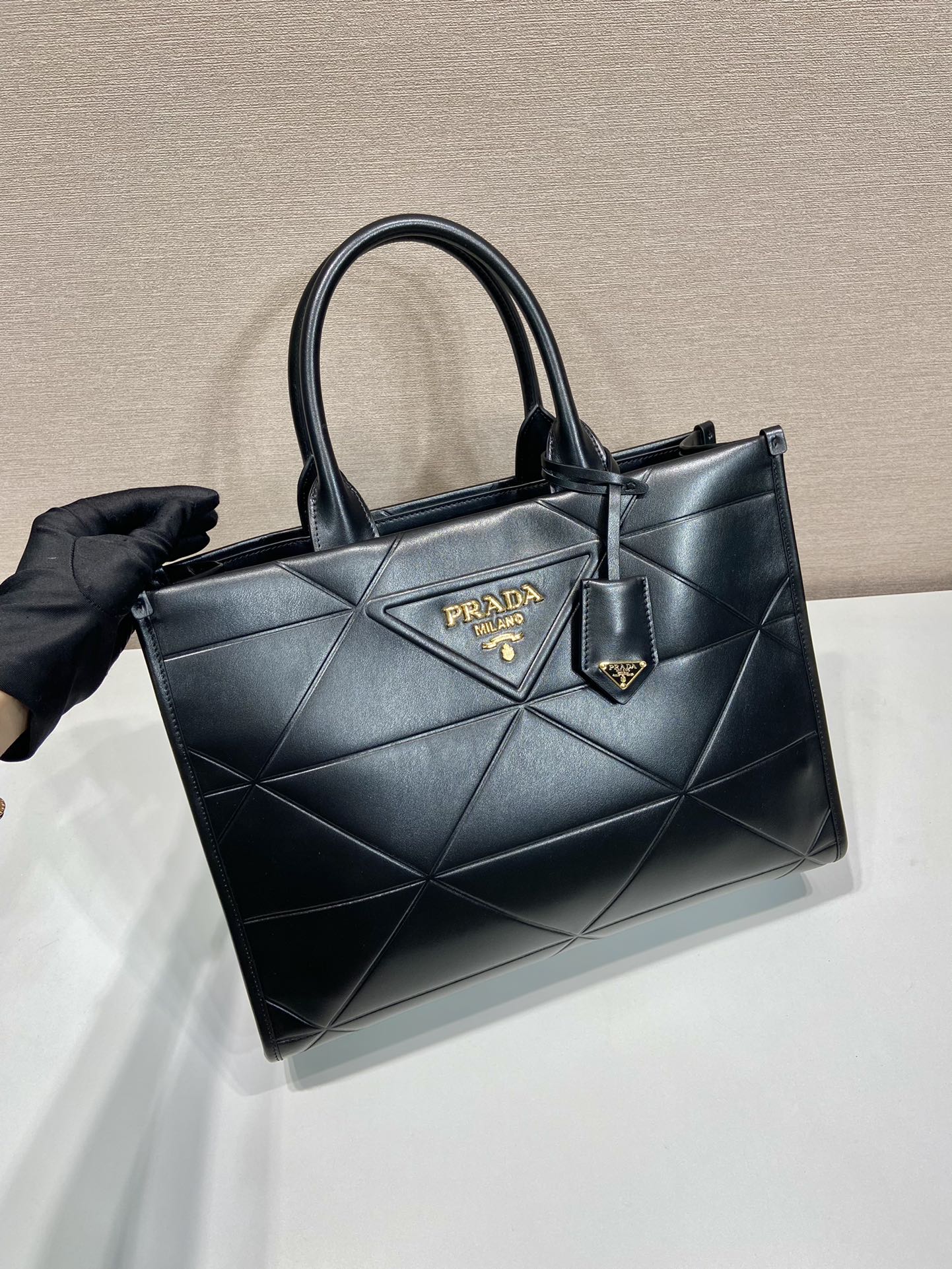 Pra*a medium leather Pra*a symbole bag with topstitching