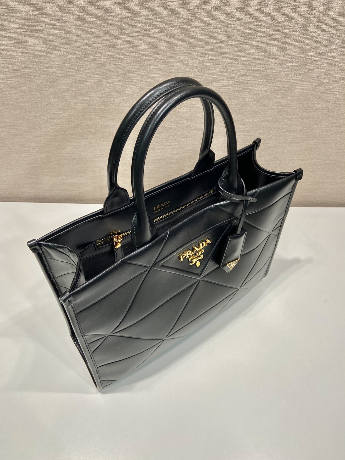 Pra*a medium leather Pra*a symbole bag with topstitching
