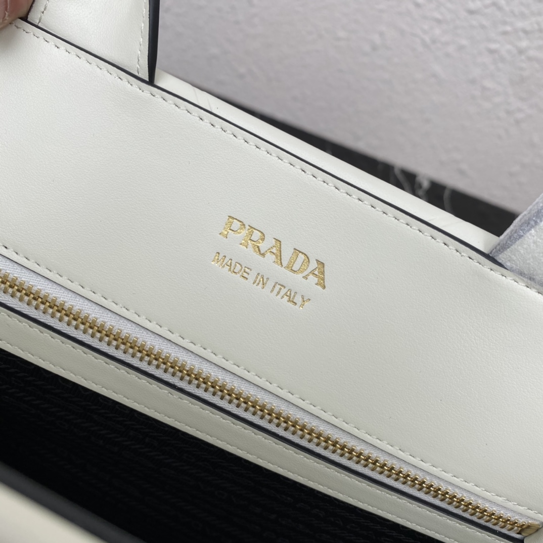 Pra*a medium leather Pra*a symbole bag with topstitching