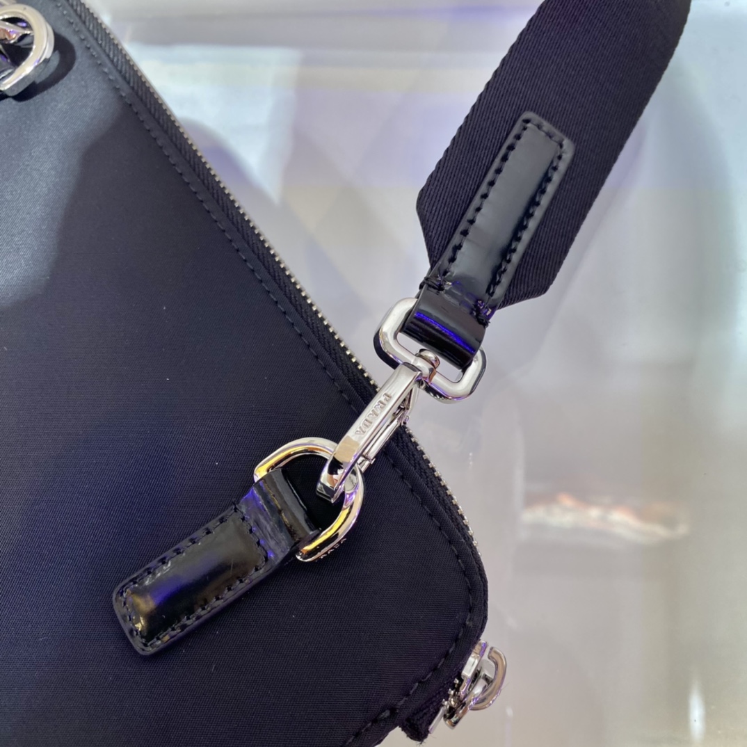 Pra*a re-nylon and leather shoulder bag