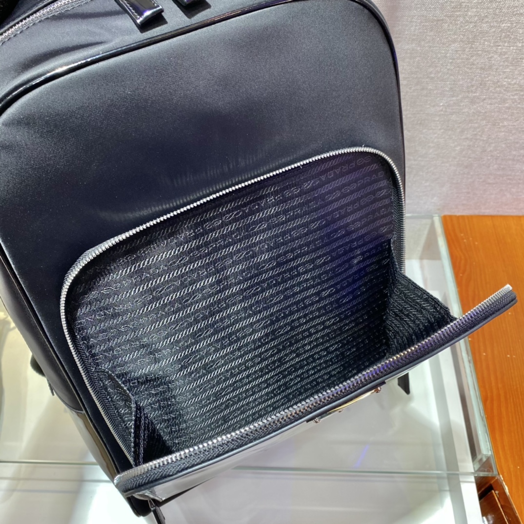 Pra*a black re-nylon and leather backpack