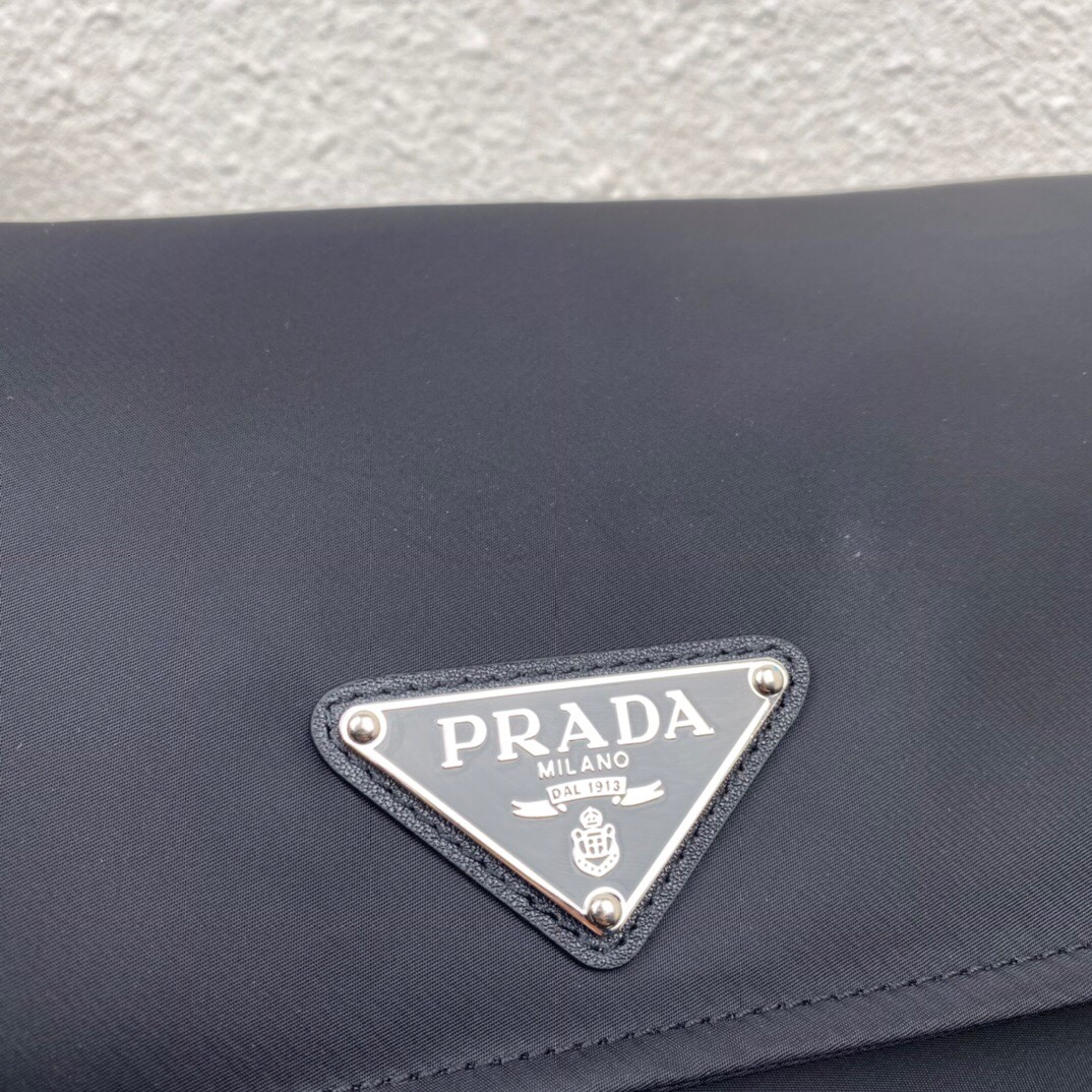 Pra*a  black medium padded re-nylon shoulder bag