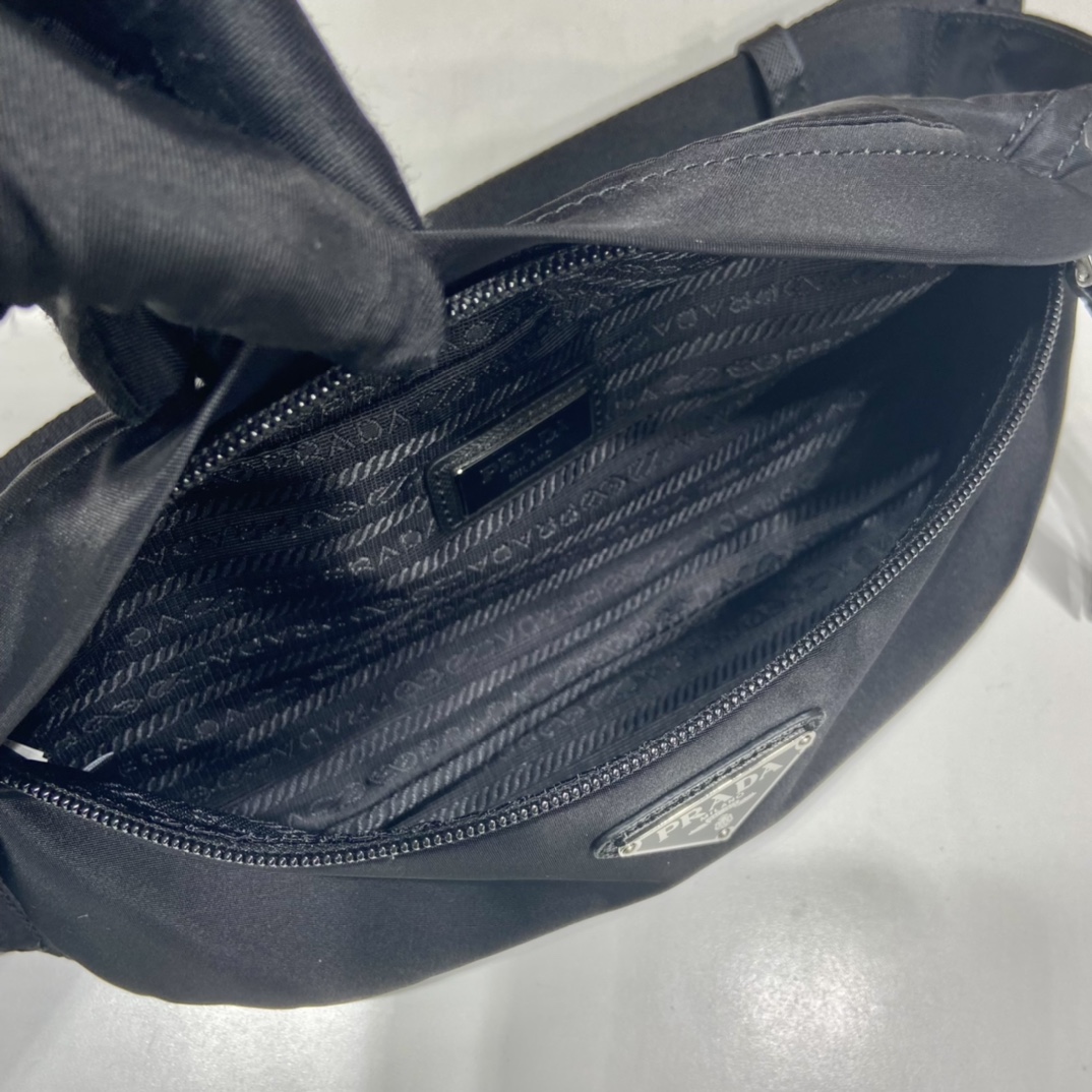 Pra*a black re-nylon and saffiano leather belt bag