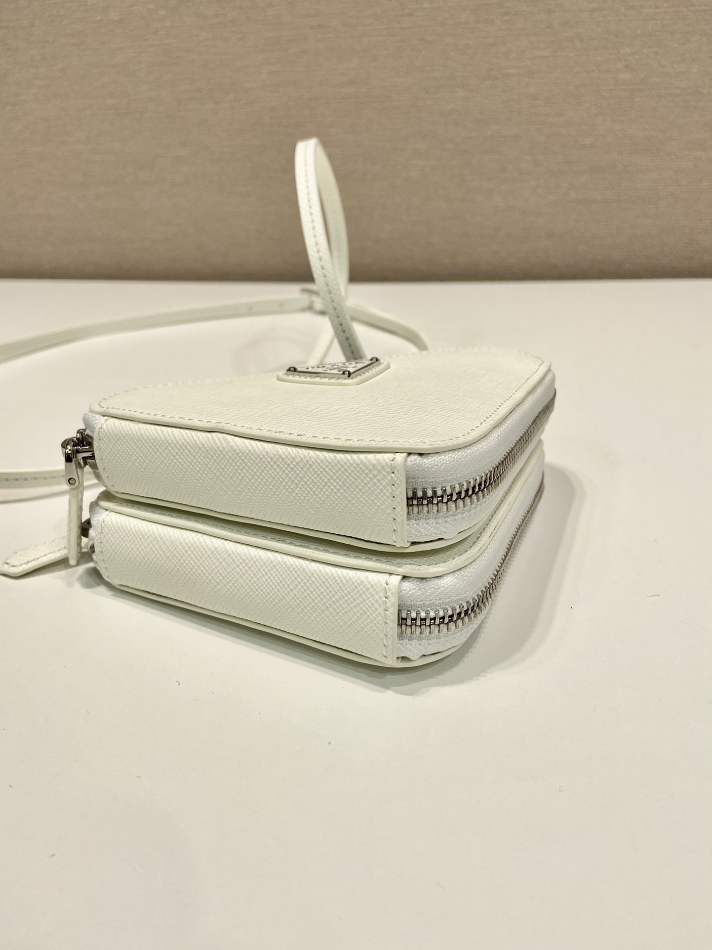 Pra*a saffiano leather mini pouch