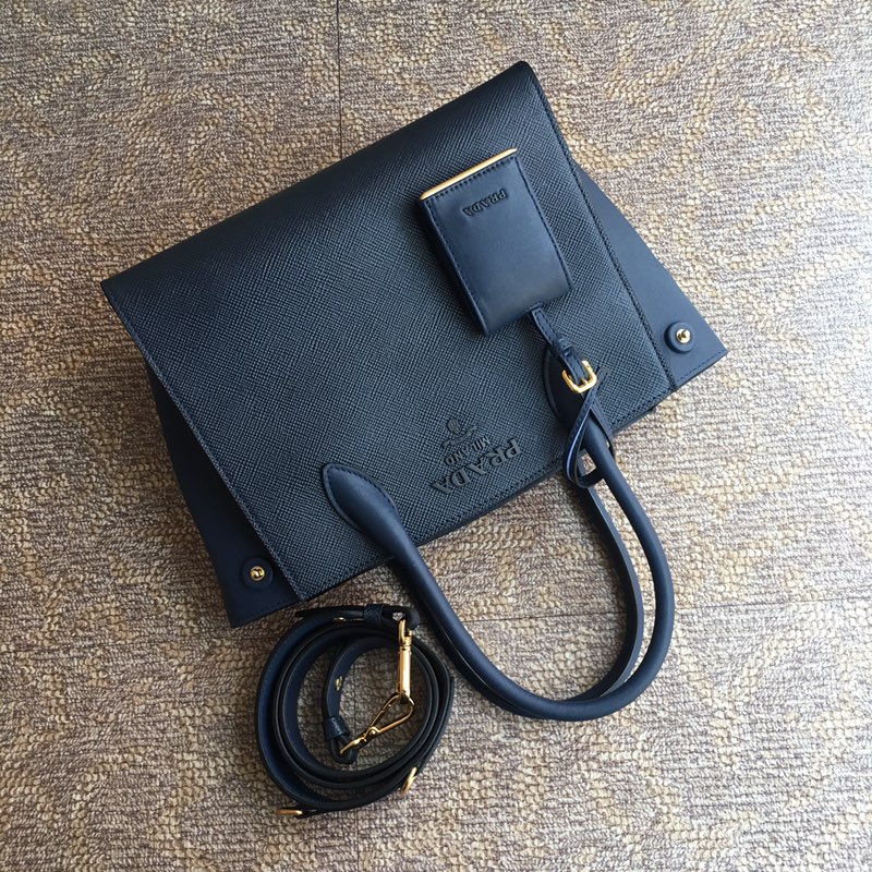 Pra*a monochrome small saffiano bag