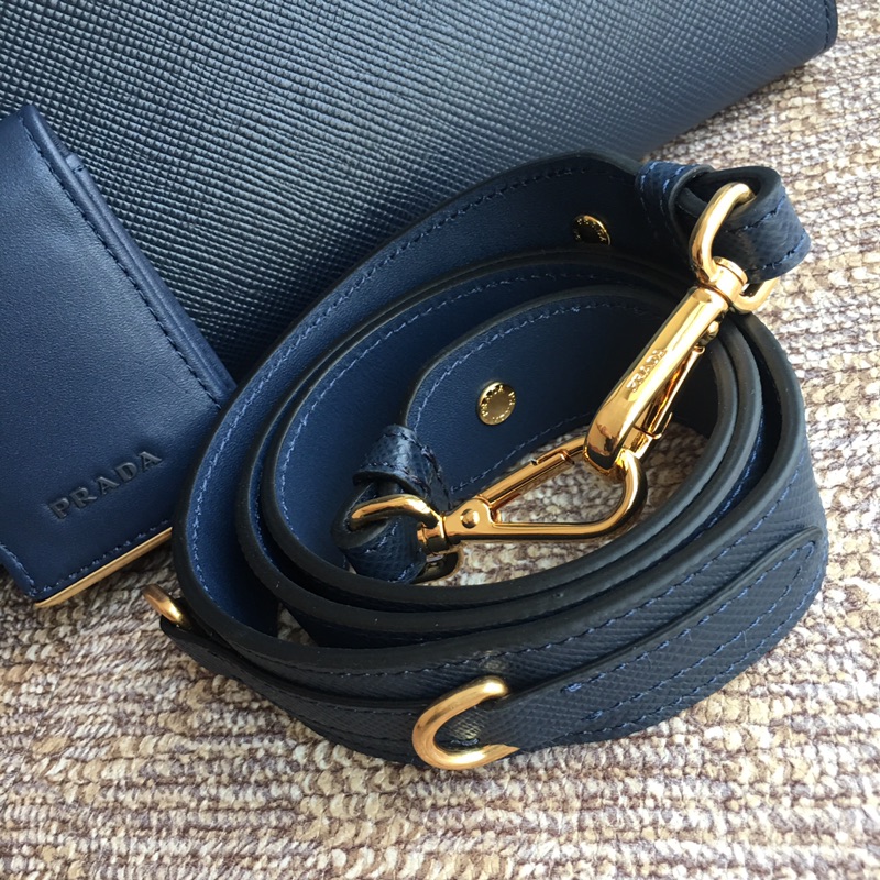 Pra*a monochrome small saffiano bag