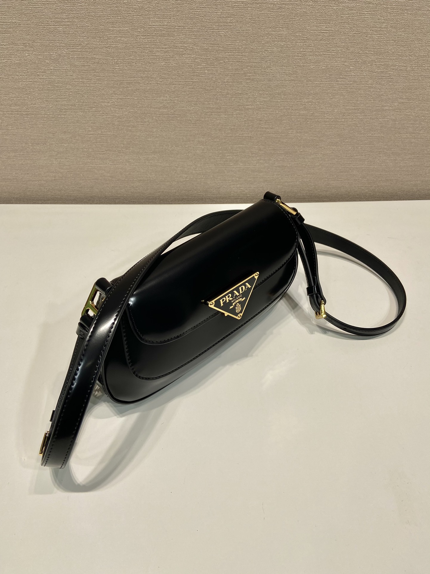 Pra*a brushed leather shoulder bag