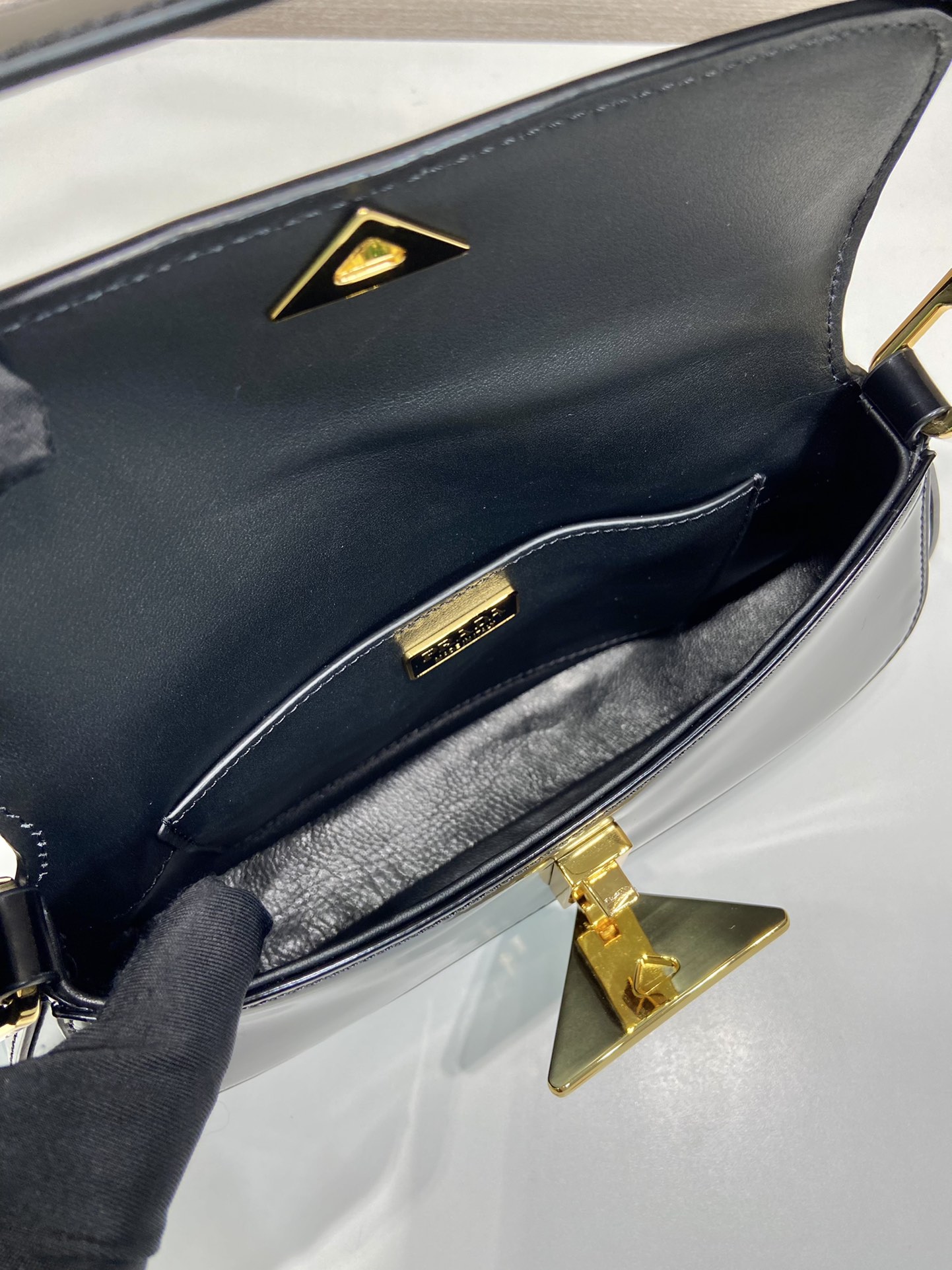 Pra*a brushed leather shoulder bag