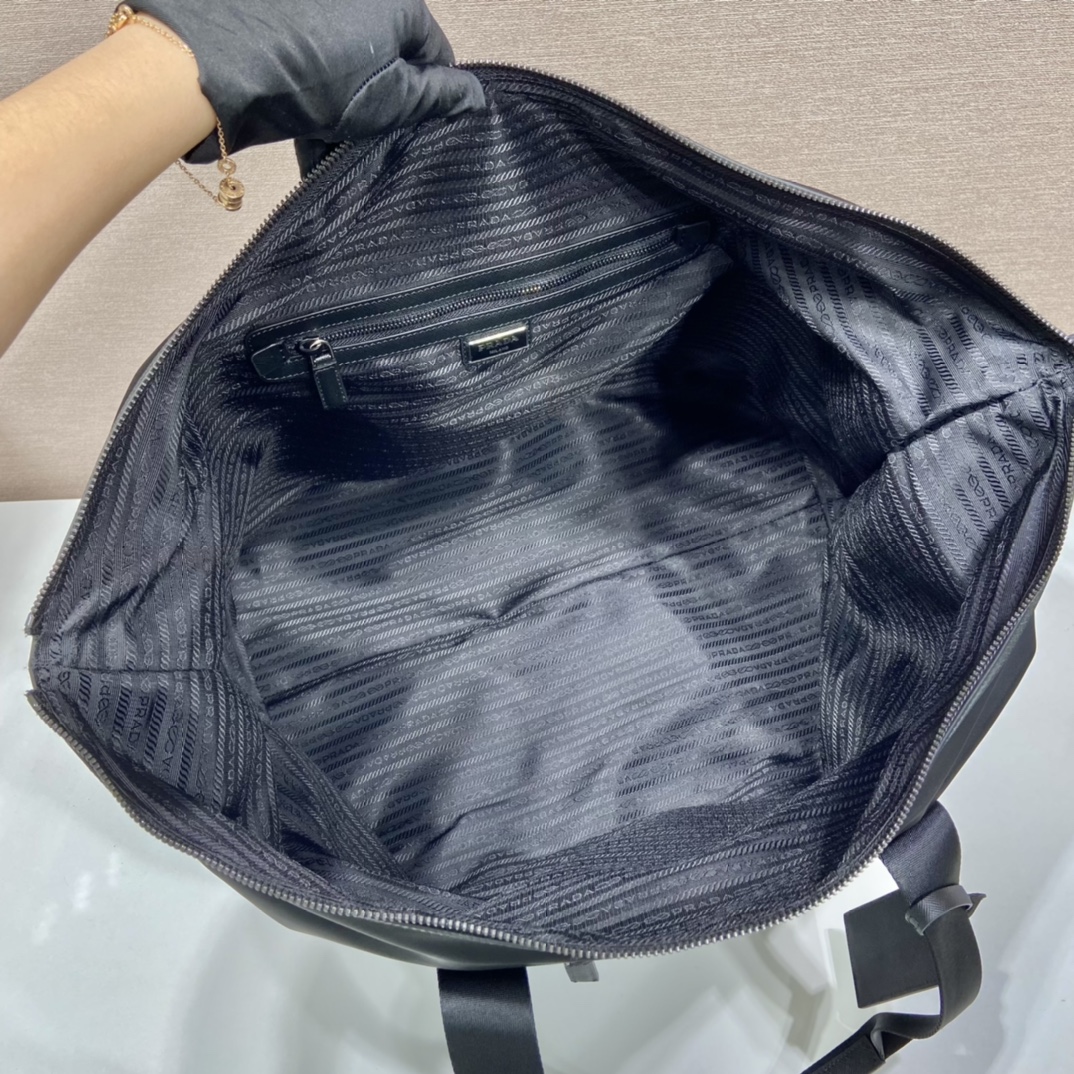 Pra*a re-nylon and saffiano leather duffle bag