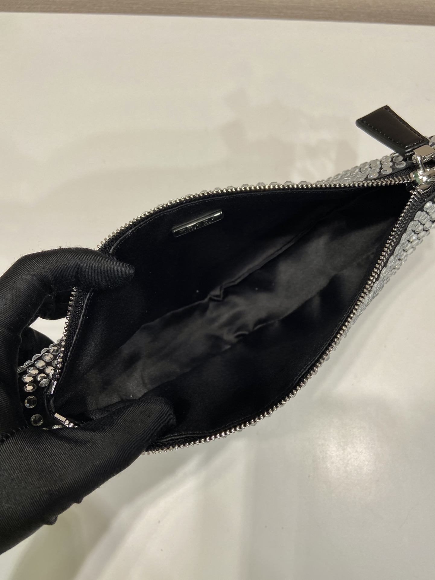 Pra*a triangle satin mini-bag with crystals