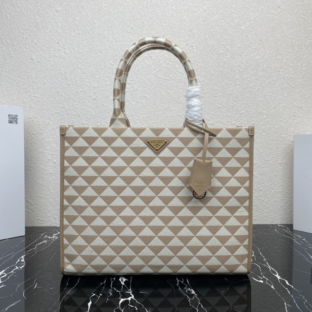 large Pra*a symbole embroidered fabric handbag