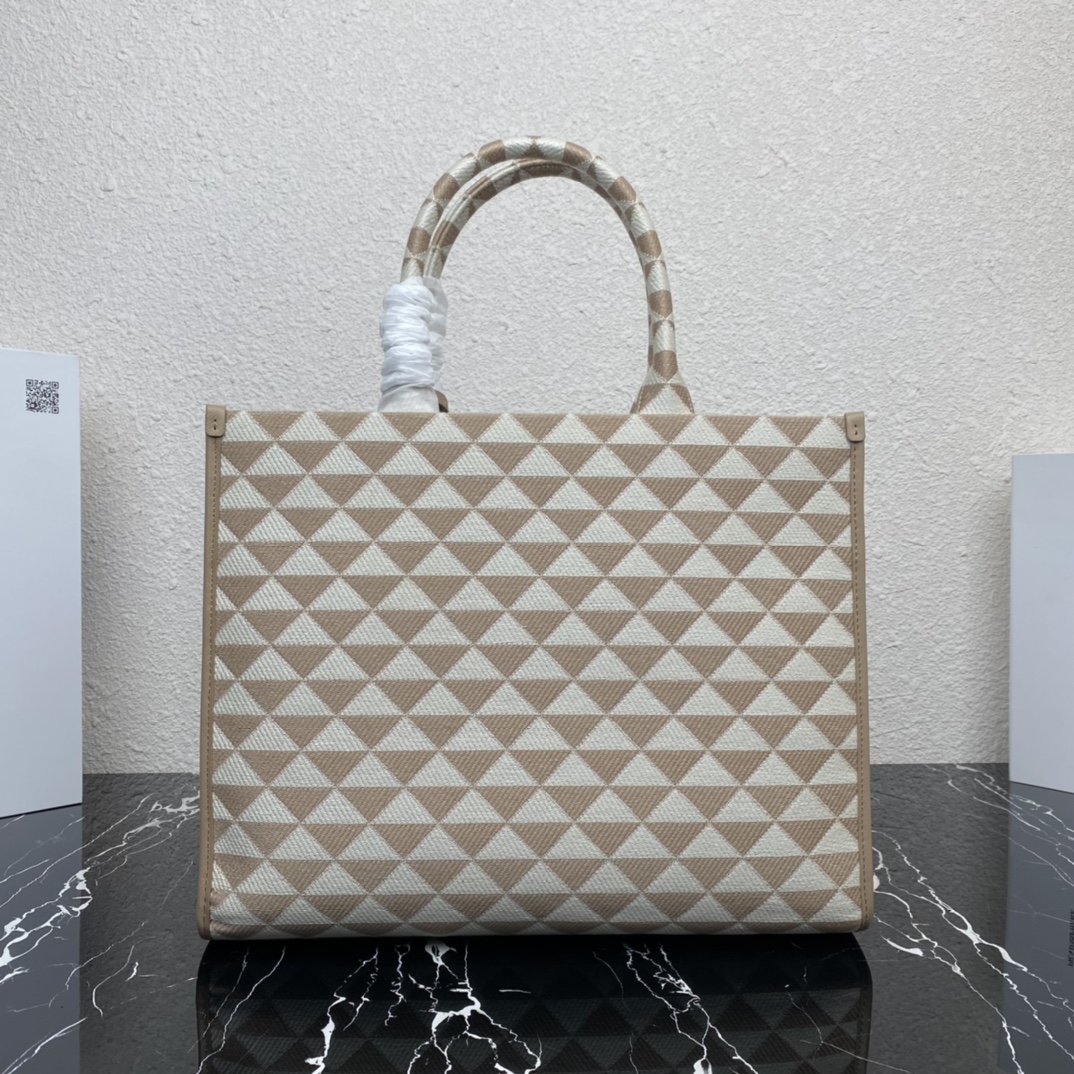 large Pra*a symbole embroidered fabric handbag