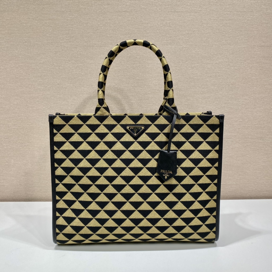 large Pra*a symbole embroidered fabric handbag
